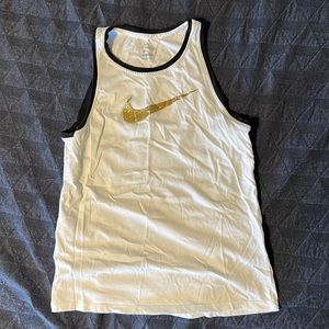 Nike women’s tank top. White with gold check. Size S.